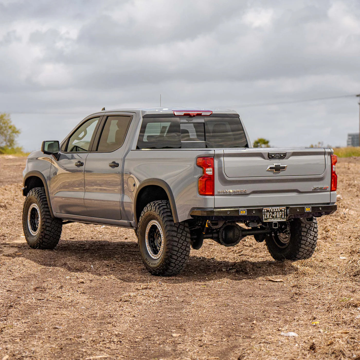 2.5 Smooth Body Shocks | DCA Piggyback Reservoir - 19+ Silverado/Sierra 1500 | Dirt King